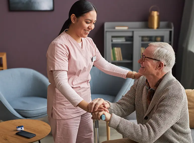 A nurse providing medical care to a patient at home.